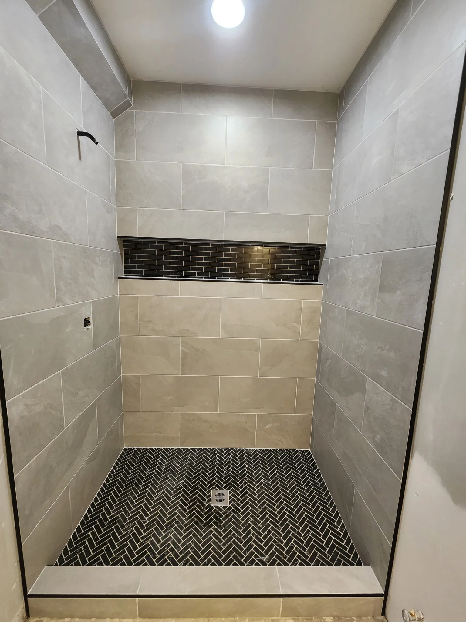 Modern bathroom remodel with walk-in shower and updated vanity