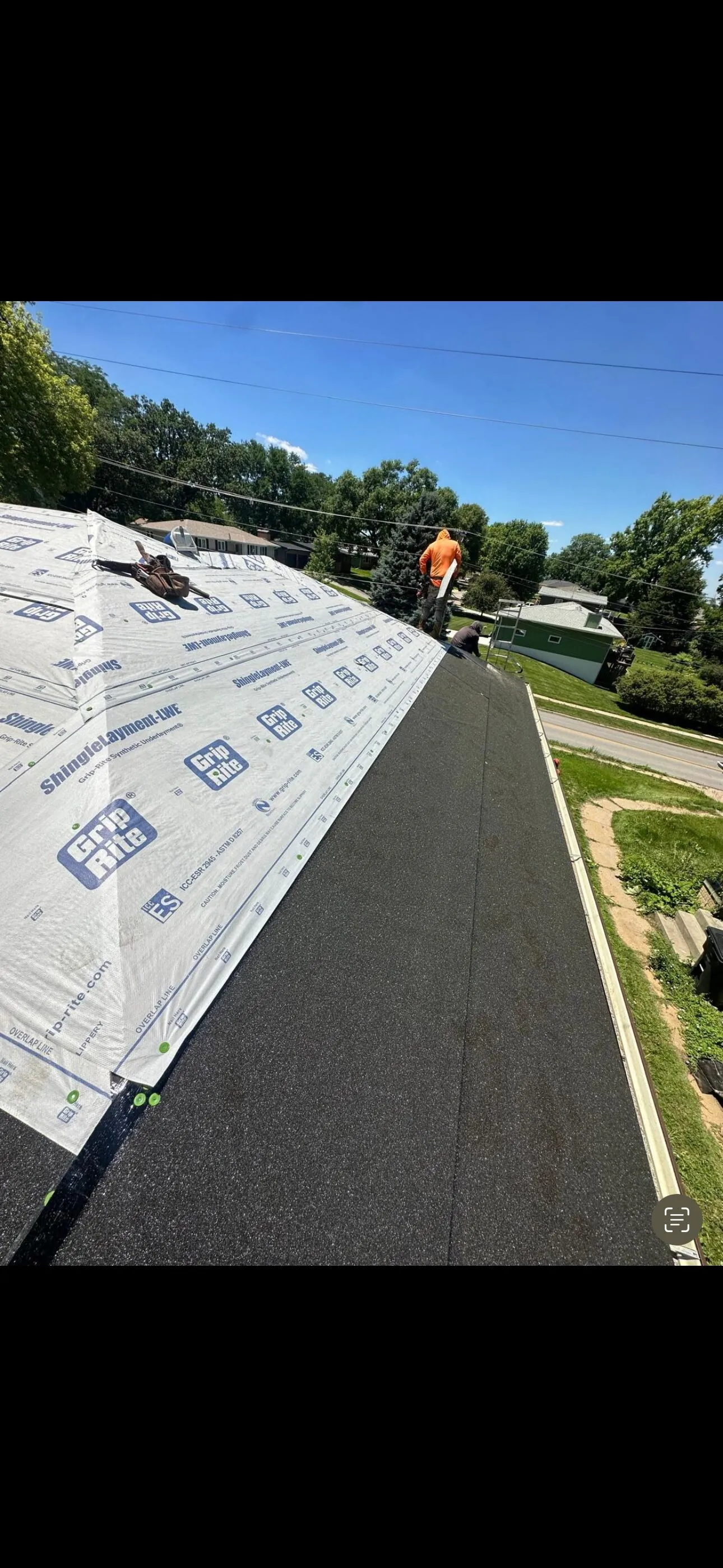 Professional roof repair and restoration on Omaha home